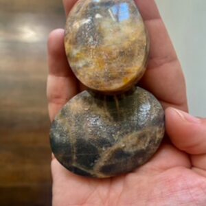 Black moonstone palm stone